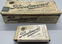 Click image for larger version. 

Name:	1909-11-t206-piedmont-cigarettes-tin-and-pack.jpg 
Views:	46 
Size:	132.5 KB 
ID:	18607