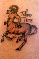 Click image for larger version. 

Name:	page2_ri_tebow-tattoo_mb_400.jpg 
Views:	100 
Size:	89.1 KB 
ID:	7353